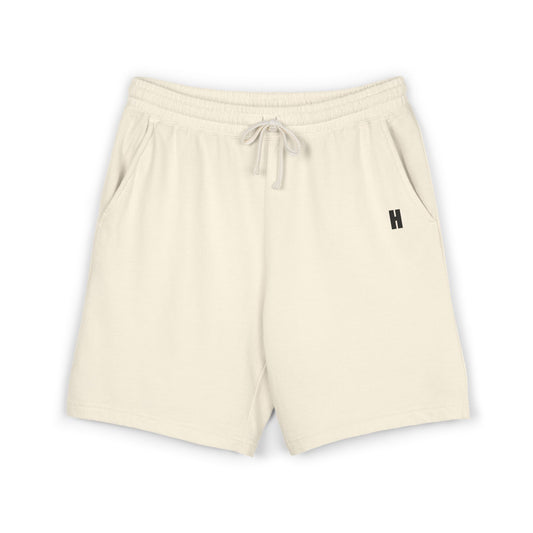 The Cooldown Short in Ivory — garment-dyed 100% cotton fleece sweat shorts, small H at the left hip